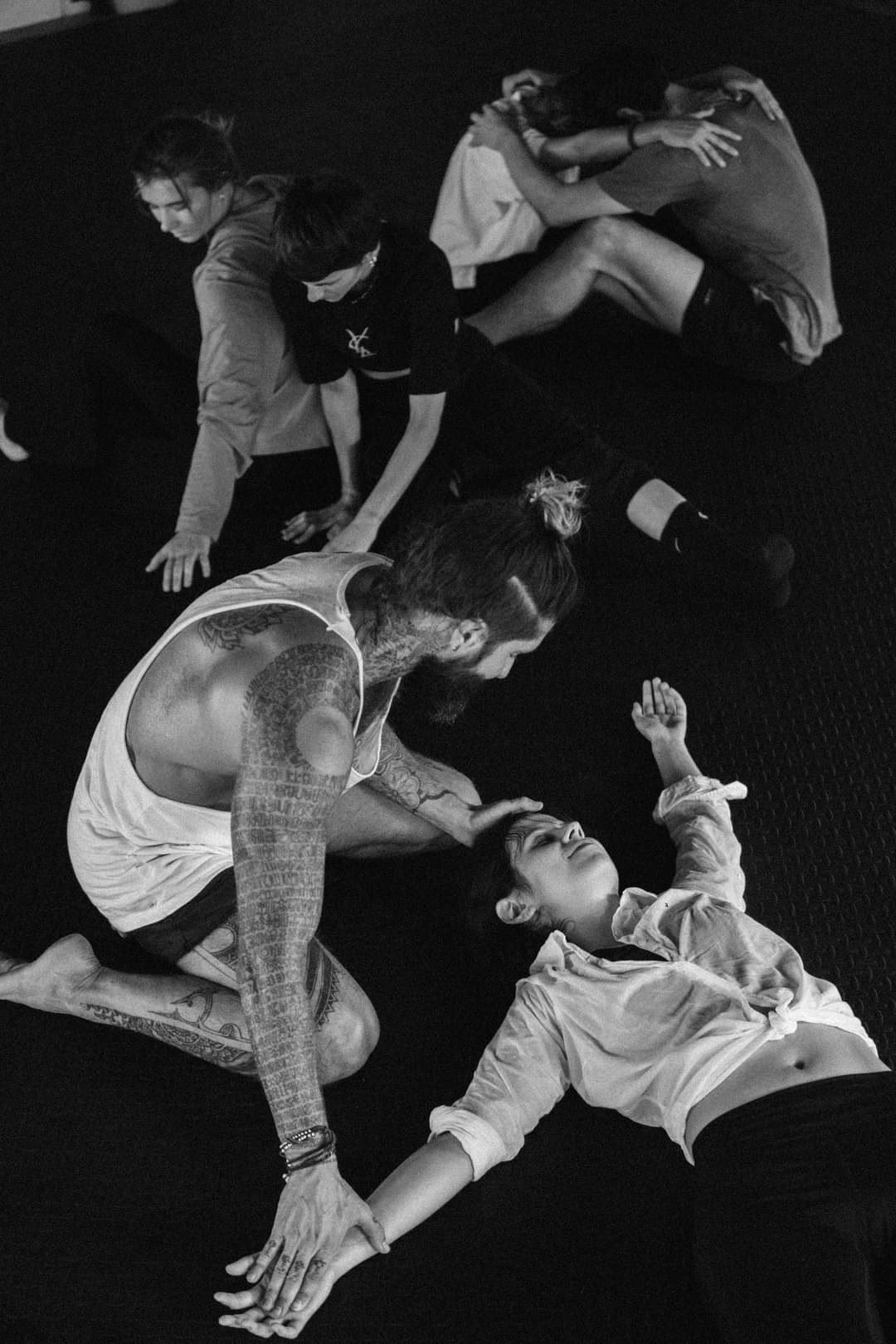 Black and white overhead shot of dancers on the floor